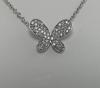 Collier or blanc motif papillon  pavage diamants