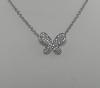 Collier or blanc motif papillon  pavage diamants